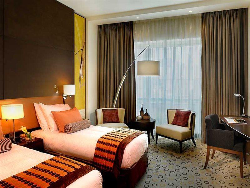 Asiana Hotel Дубай Экстерьер фото A room at the hotel