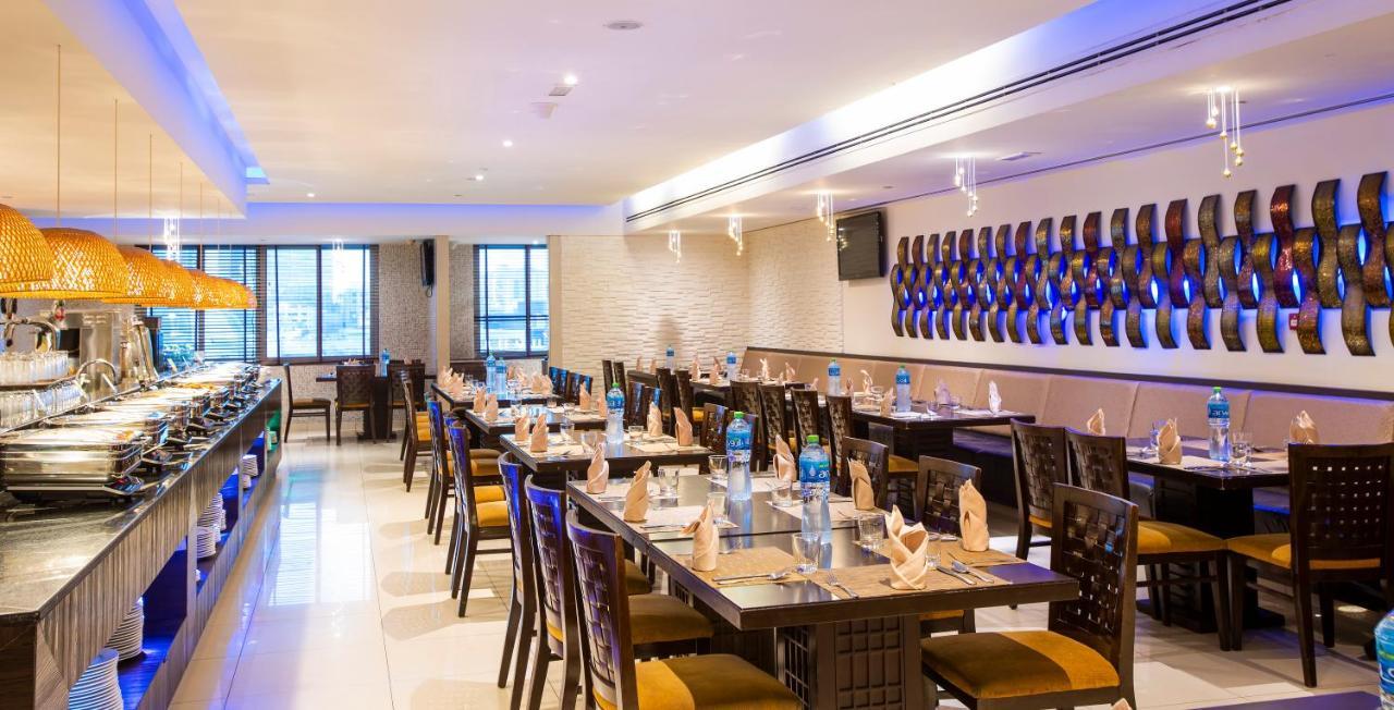 Asiana Hotel Дубай Экстерьер фото The restaurant