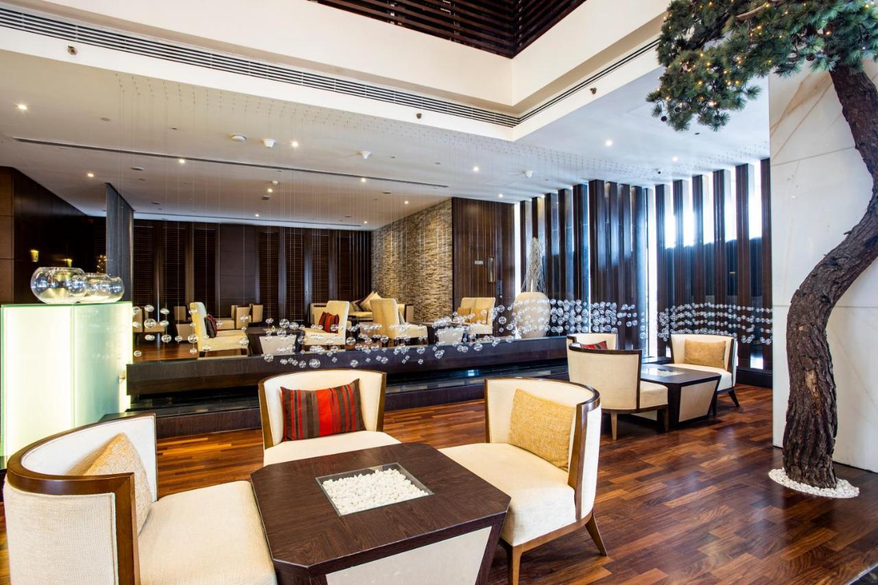 Asiana Hotel Дубай Экстерьер фото The lobby of the hotel