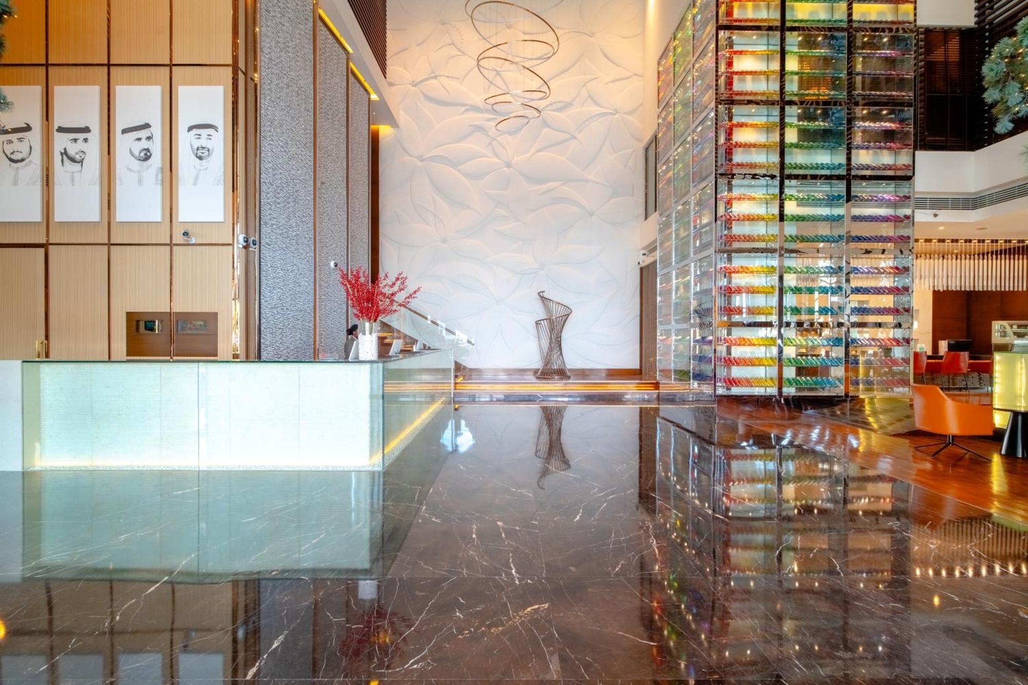 Asiana Hotel Дубай Экстерьер фото The lobby of the hotel