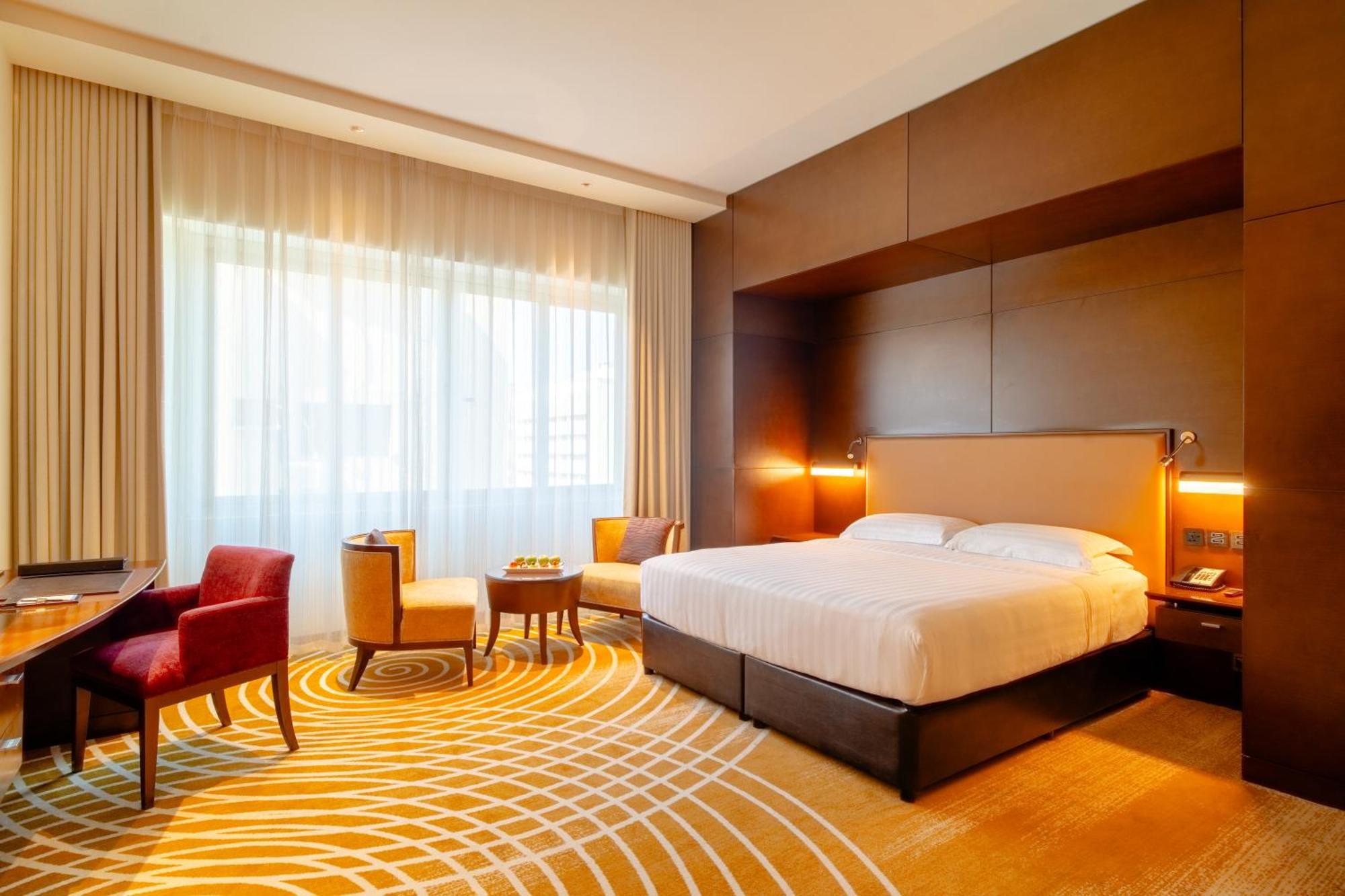 Asiana Hotel Дубай Экстерьер фото A room at the hotel