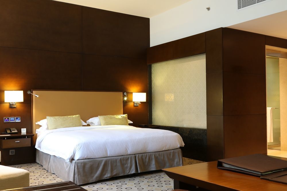Asiana Hotel Дубай Экстерьер фото A bedroom at the hotel